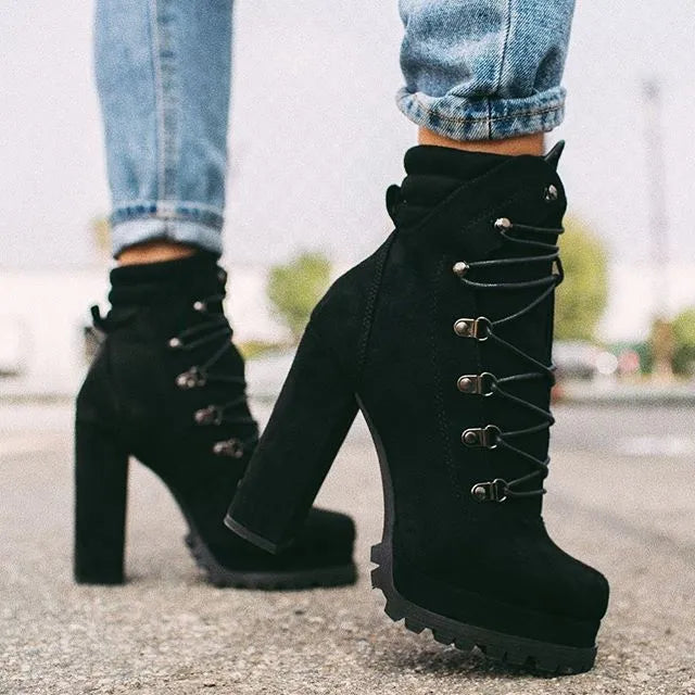Women's suede ankle boots with a thick high heel and platform sole in four colour choices.