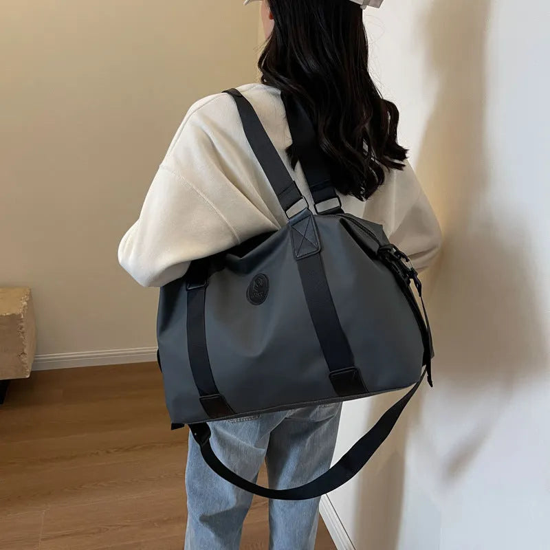 Large capacity waterproof travel bag in Oxford cloth with 36-55 litre storage