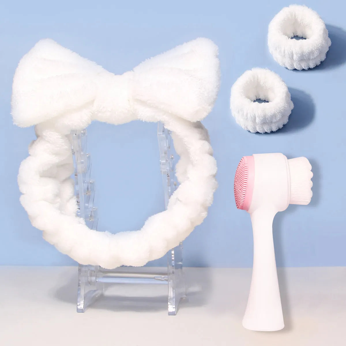 Facial brush set with coral fleece hair band in purple, nylon brush with plastic handle for skincare cleansing