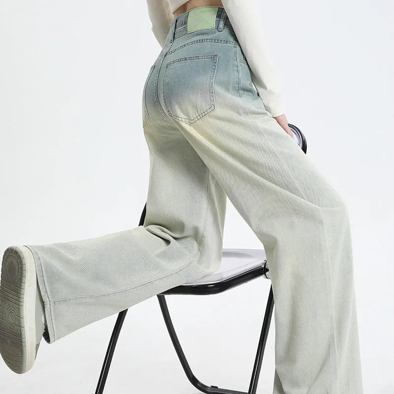 Gradient blue women's denim trousers with straight-leg cut and wider leg opening