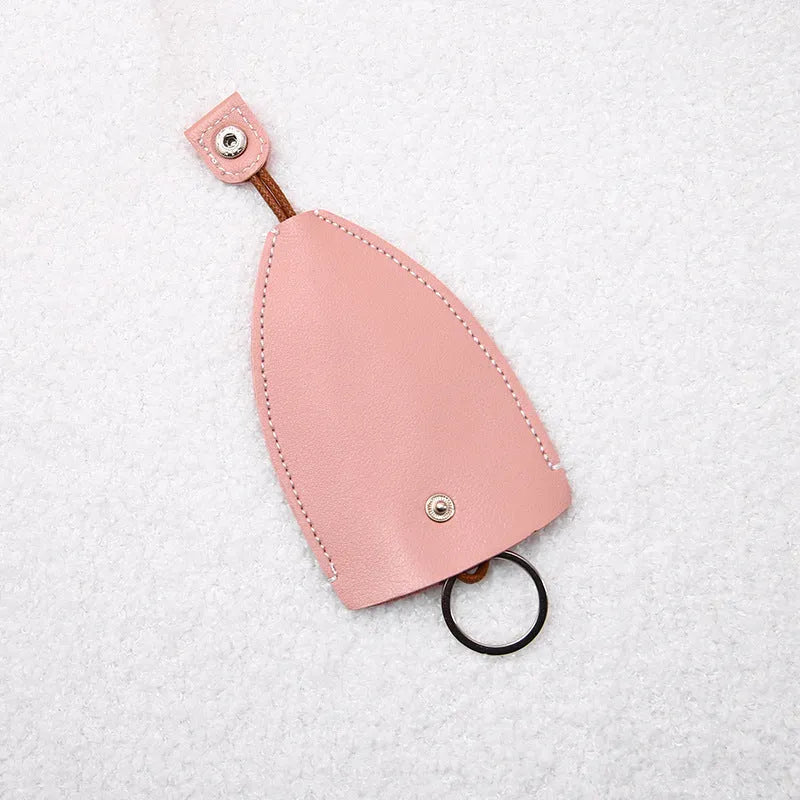 Cartoon pull-out car key case in PU leather with colourful designs measuring 14 x 7.5 cm