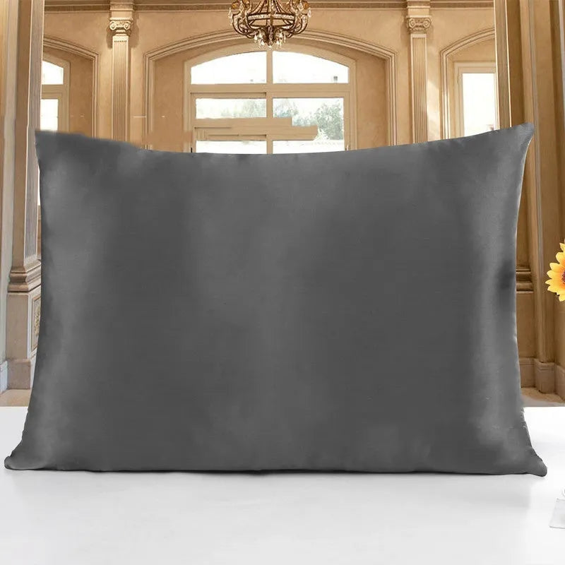 19 M double-sided silk pillowcase in apricot colour showing smooth texture and hem detail.