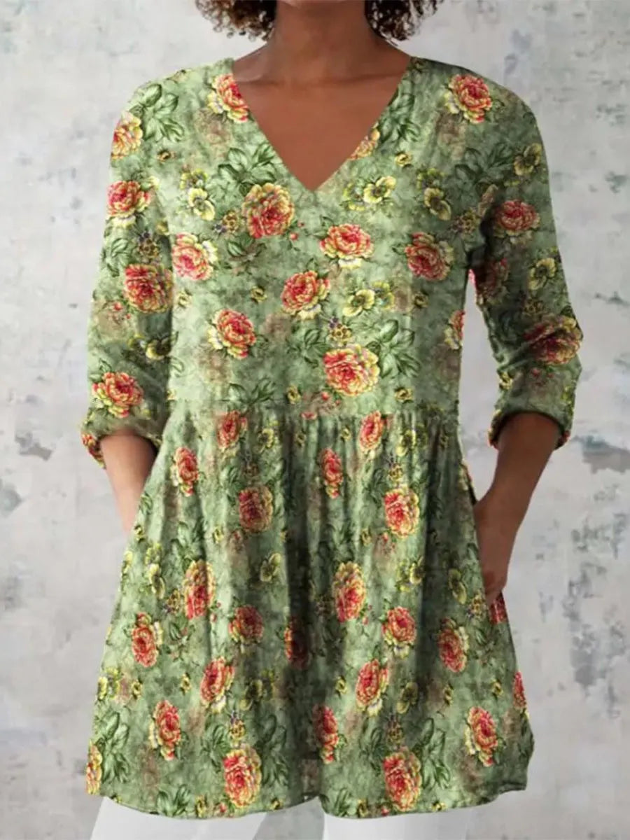 Women's printed floral dress with loose fit, wide waist, and 3/4 ruffle sleeves