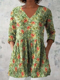 Women's printed floral dress with loose fit, wide waist, and 3/4 ruffle sleeves