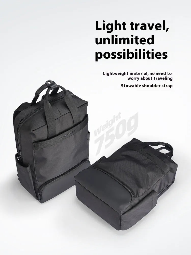 Front view of lightweight black Oxford cloth computer backpack with 20-35L capacity