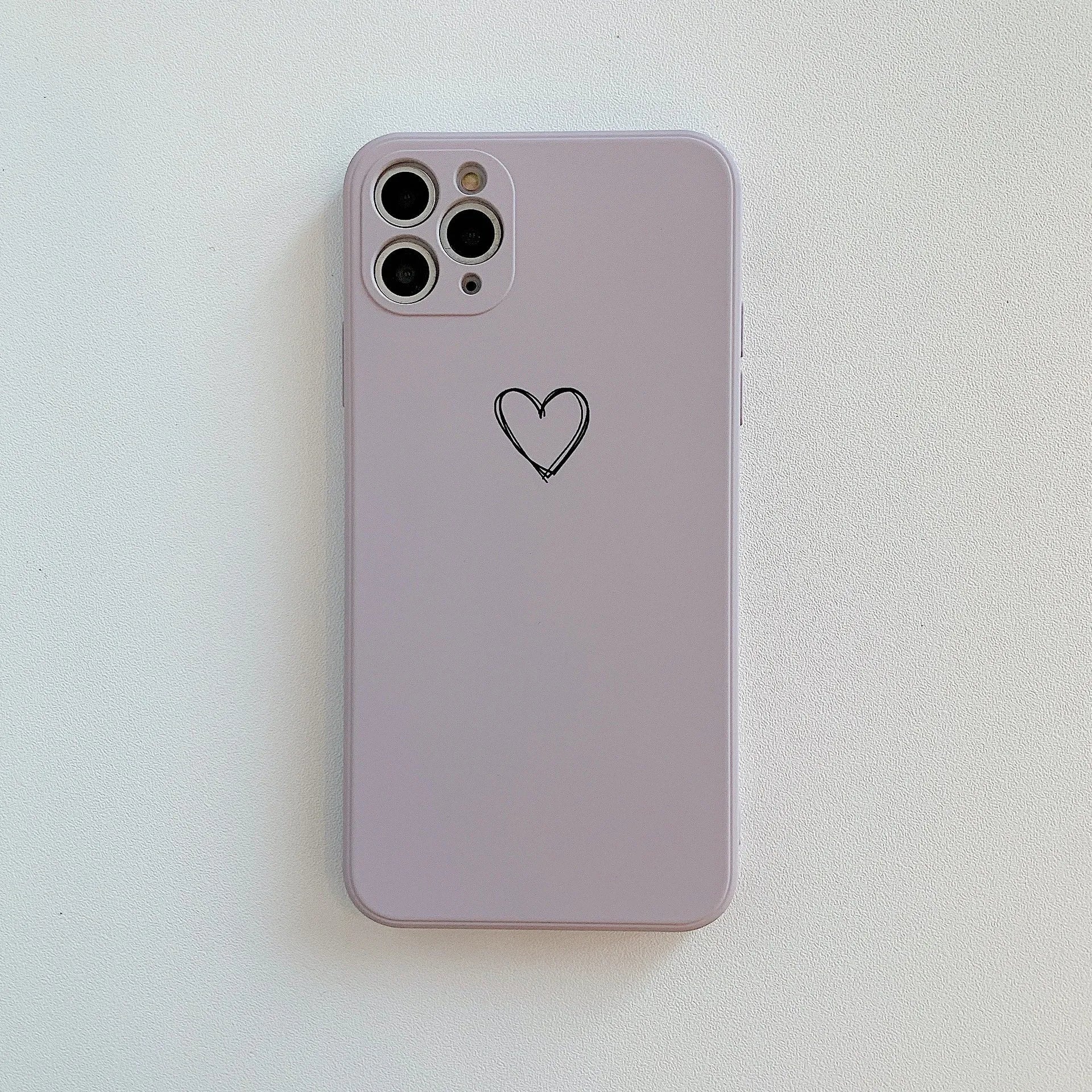 Silicone TPU back cover case for iPhone in solid colours like black, pink, and green on a white background.