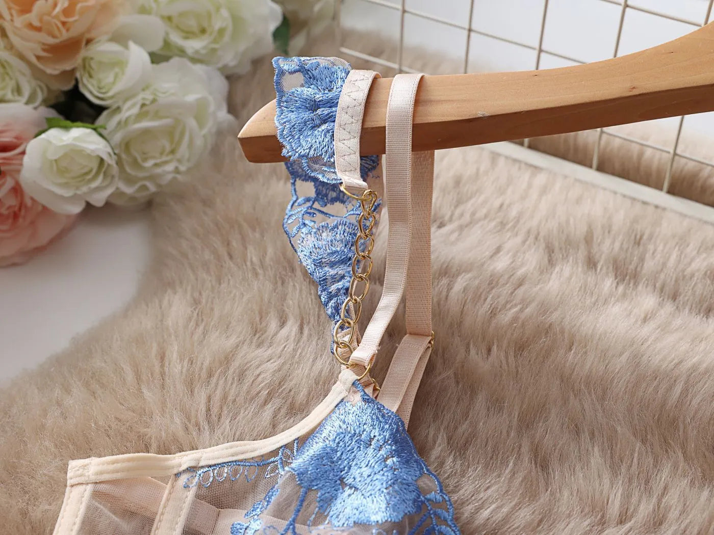 Women's light blue embroidered lace lingerie set with transparent push up bra and matching panty