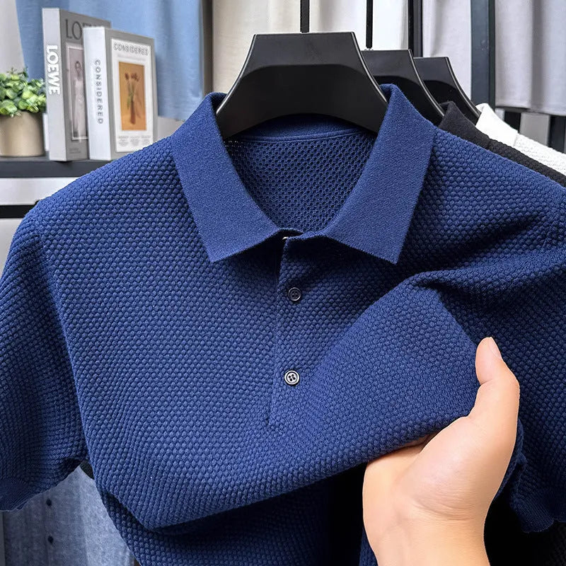 Loose fitting short sleeve cotton sweater in a neutral colour, showing pullover style and casual fit.