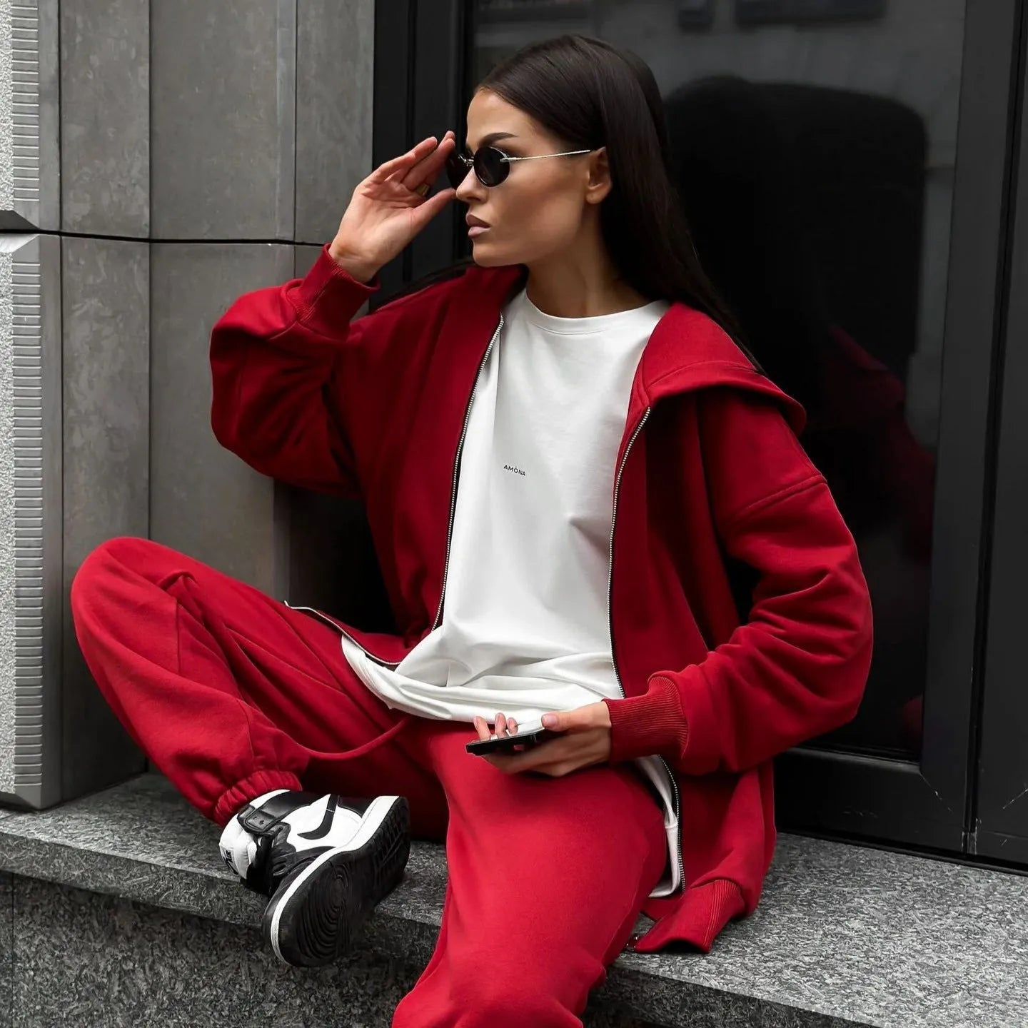 Loose fit red polyester street style coat and trousers two-piece set on a hanger