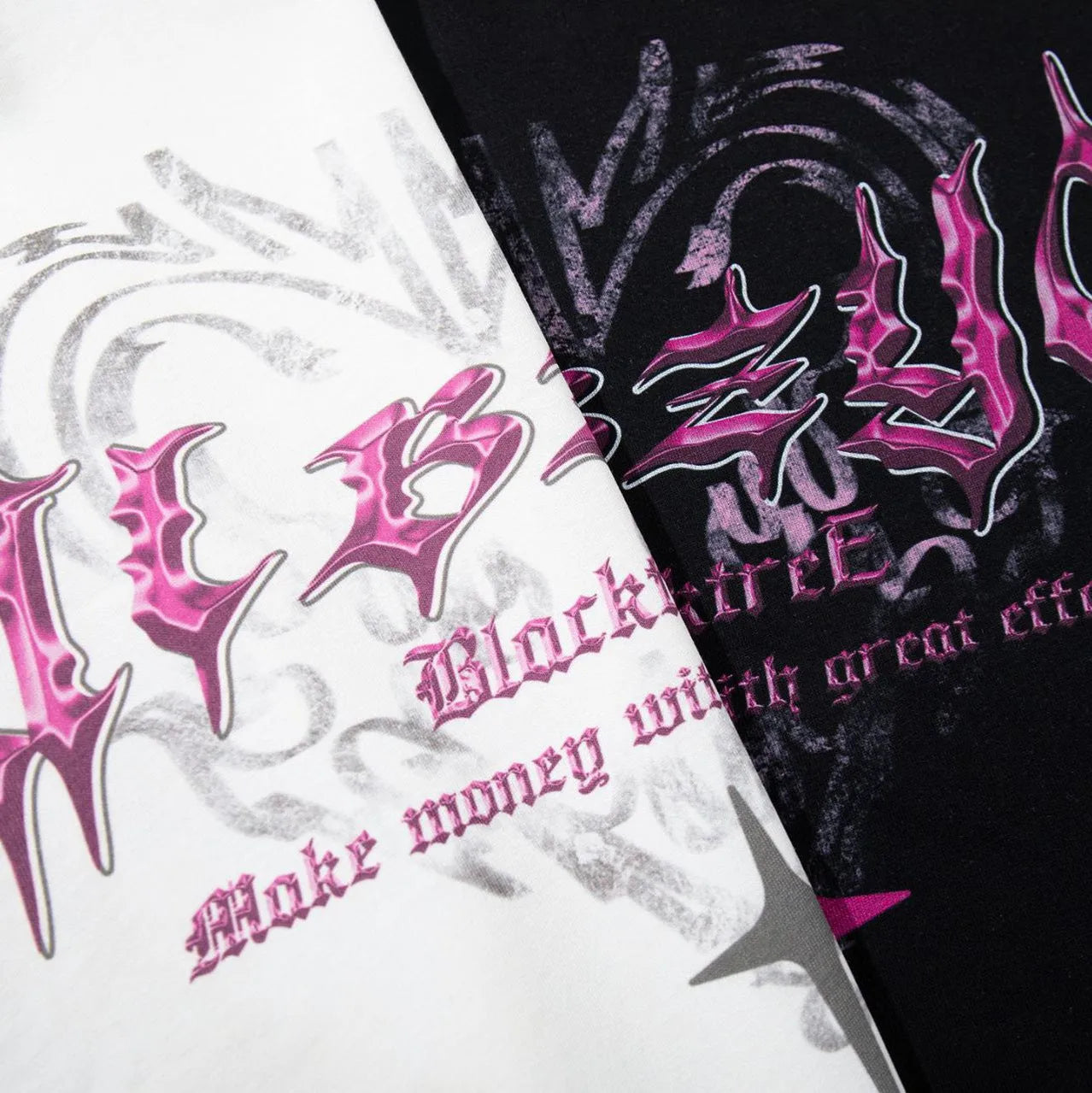 Man wearing a black loose fit cotton t-shirt with a retro graphic print on the chest.