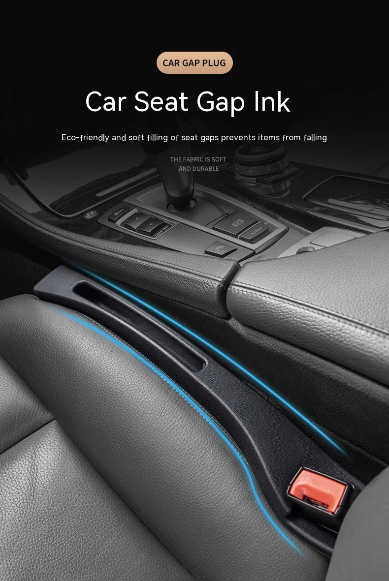 Black car gap storage box with handle positioned between car seats