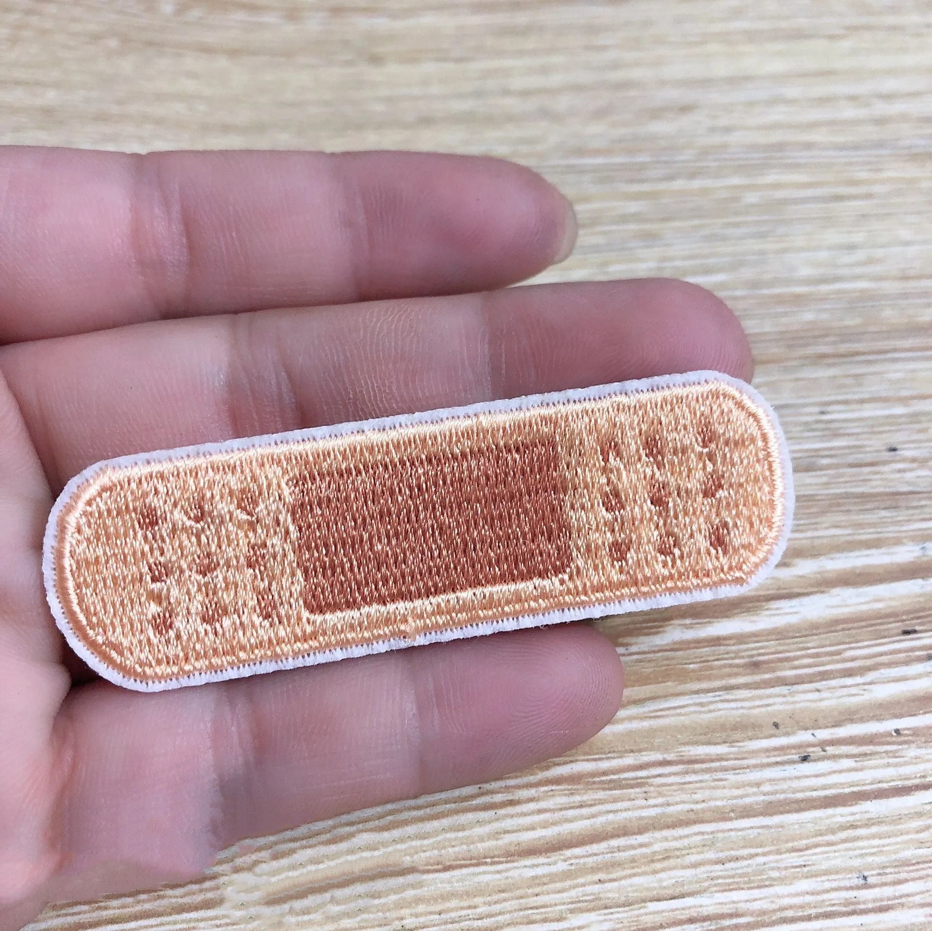 Ten computer embroidered fabric patches with detailed raised designs for clothing decoration