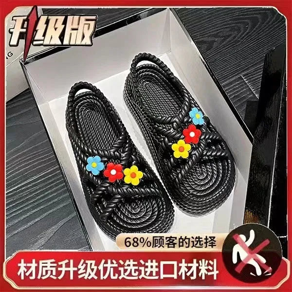Women's floral decorated PVC sandals in beige or black with non-slip soles