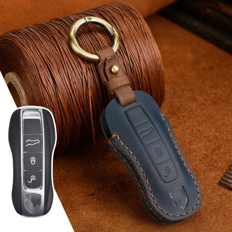 Genuine cowhide leather Porsche key case with retro bag-style buckle in blue or brown colour options