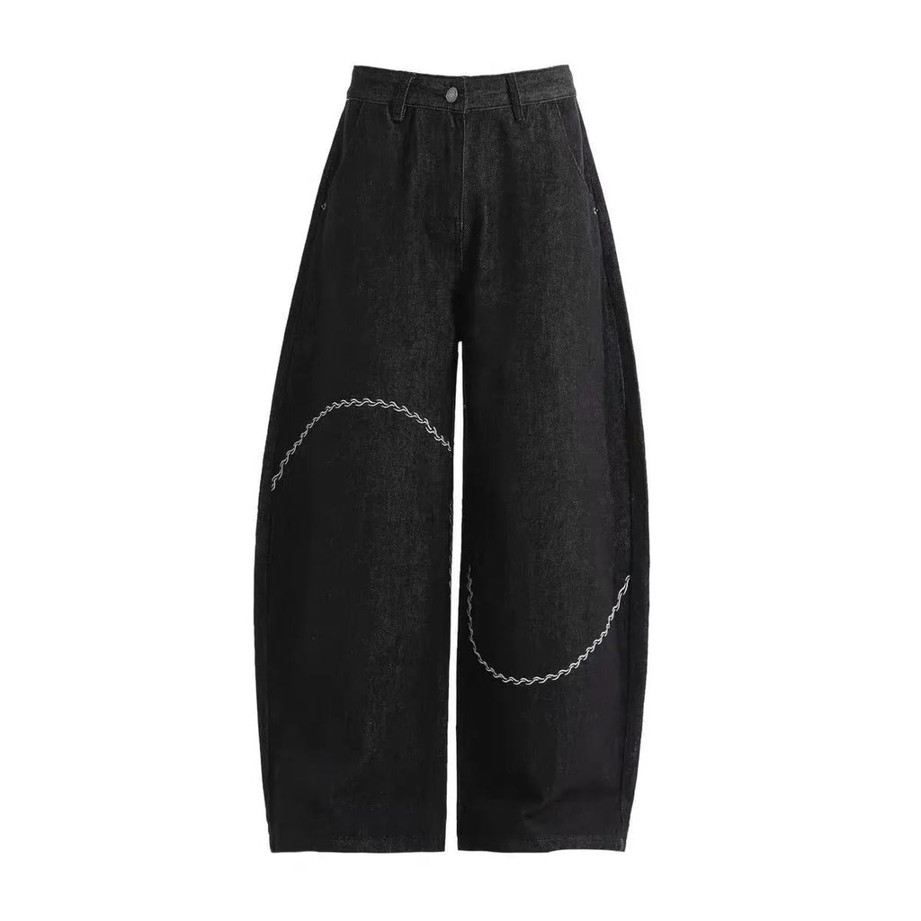 Black straight-leg men's trousers with a mid waist and zip fly, made from micro-elastic denim.