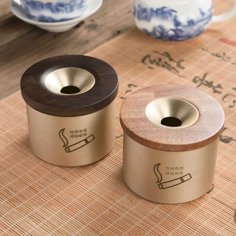 Retro-style solid copper ashtray with a wooden lid in black or red.
