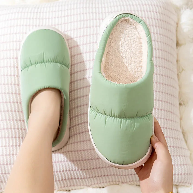 Blue plush indoor slippers with thick rubber sole and artificial fur lining