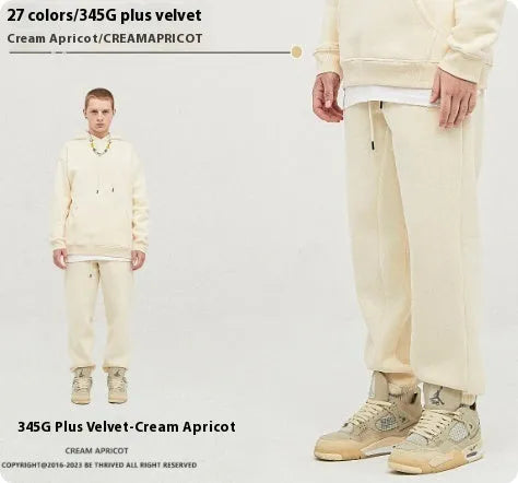 Men's solid colour velvet sweatpants with ankle banding in mid waist design