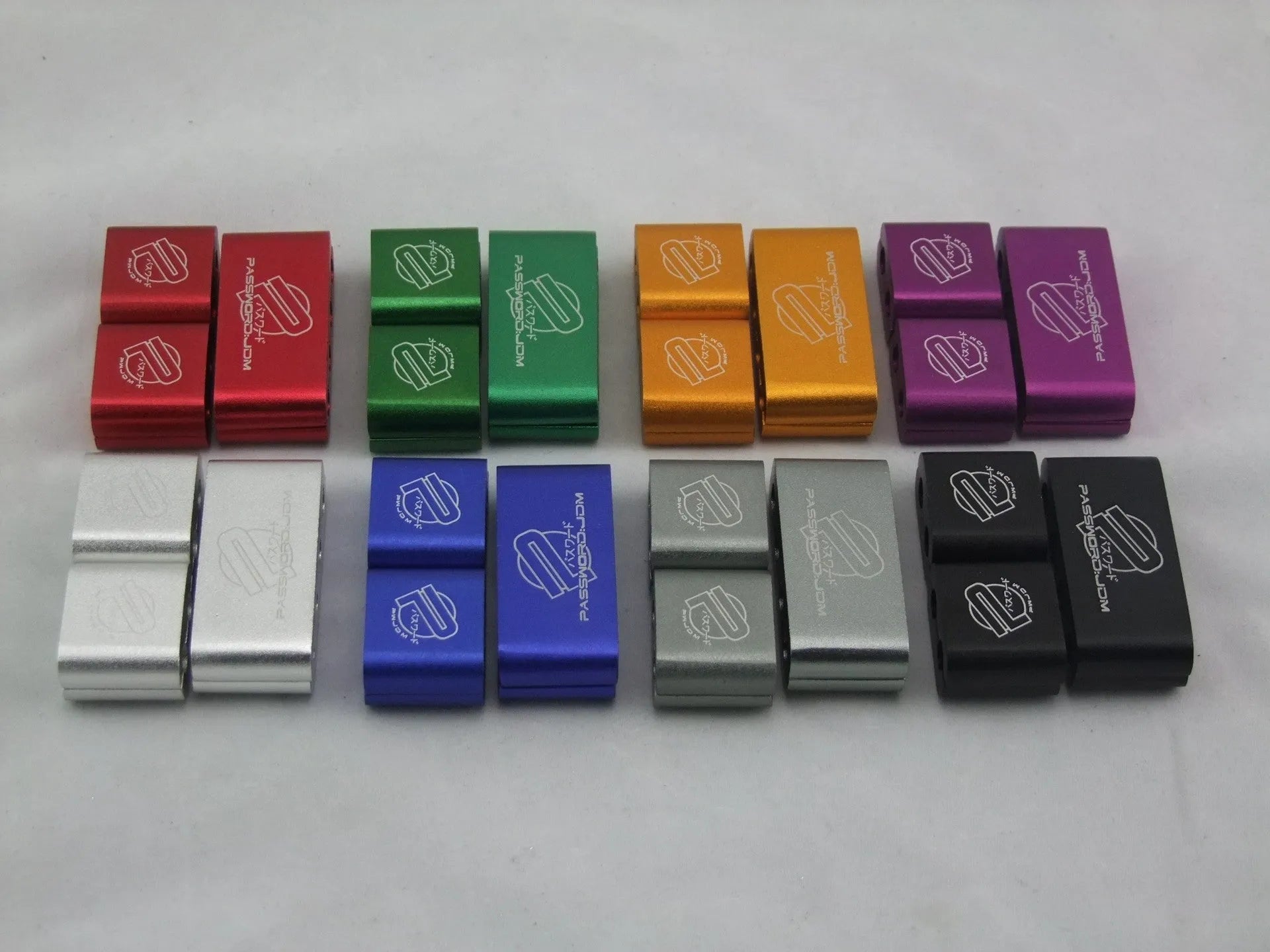 Three-piece metal car fastening clamp in assorted colours, shown with metal fixed sleeve, scale showing 55x30x25mm dimensions.