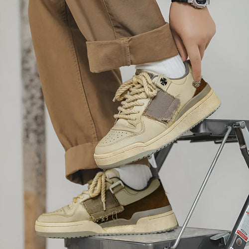 Beige vintage style low-top skateboard shoes with round toe and lace-up front