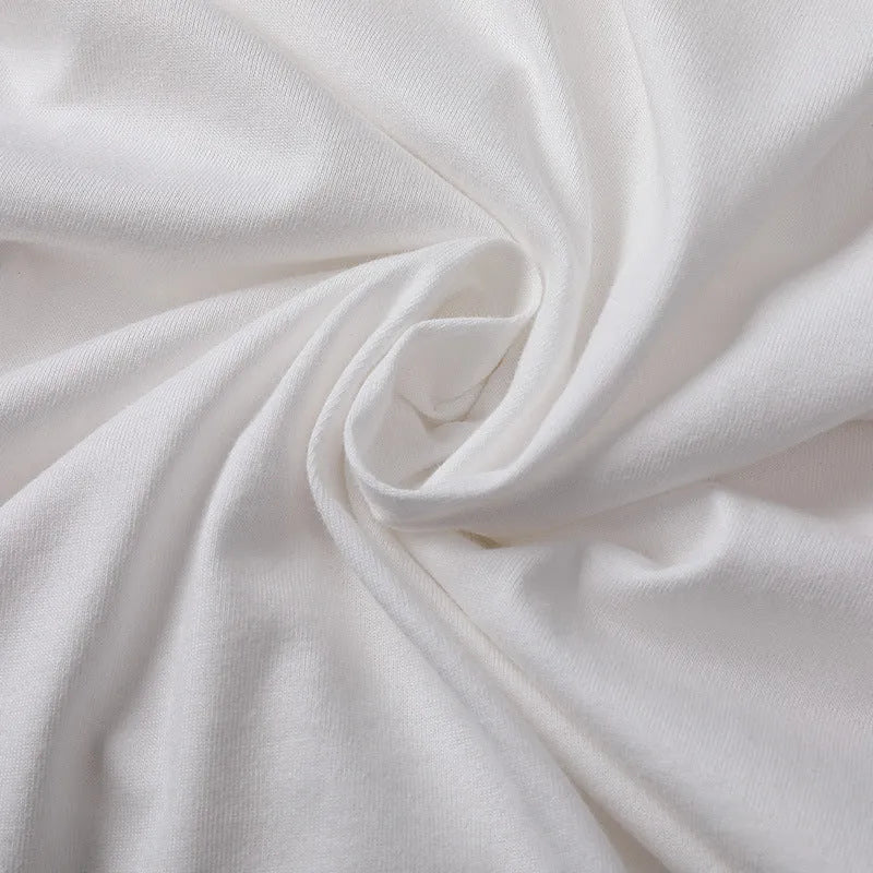 Men's plain pure cotton short sleeve t-shirt on a hanger, shown in apricot colour.