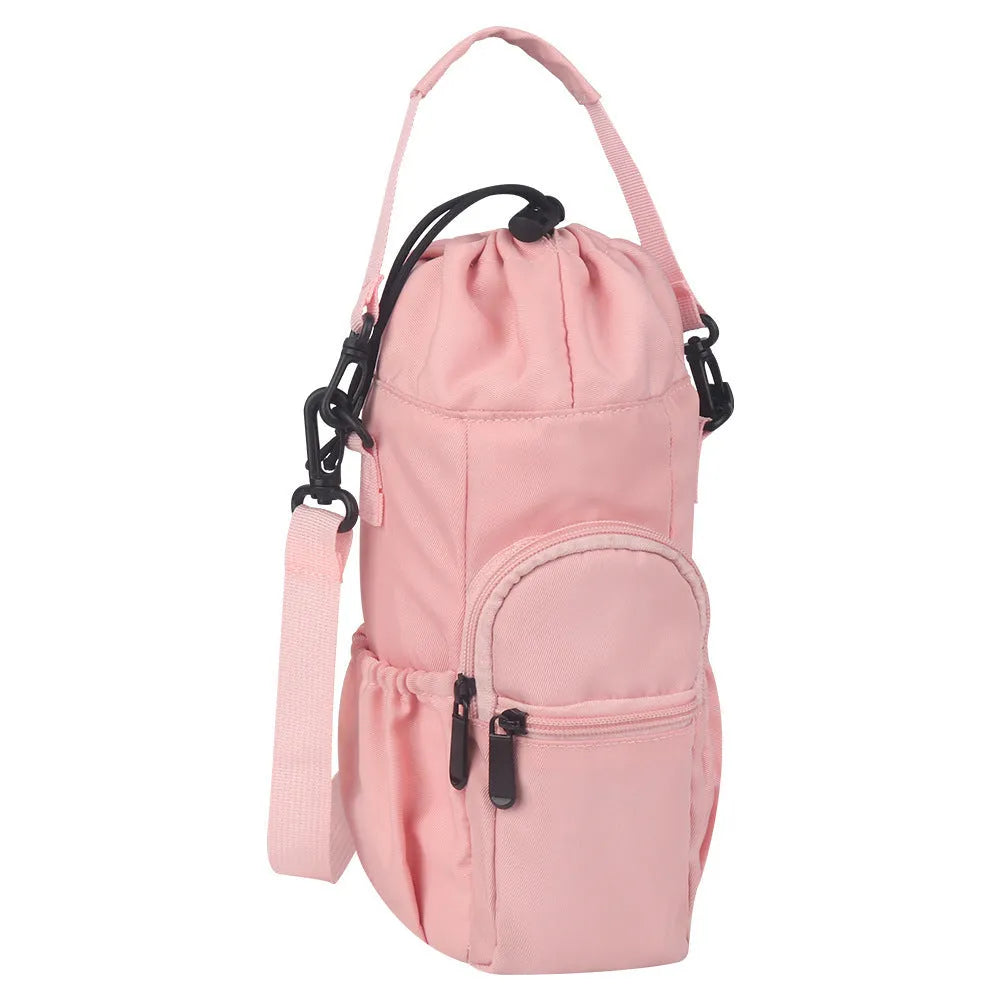 Canvas water bottle shoulder bag with crossbody strap in black, green, and pink colour options