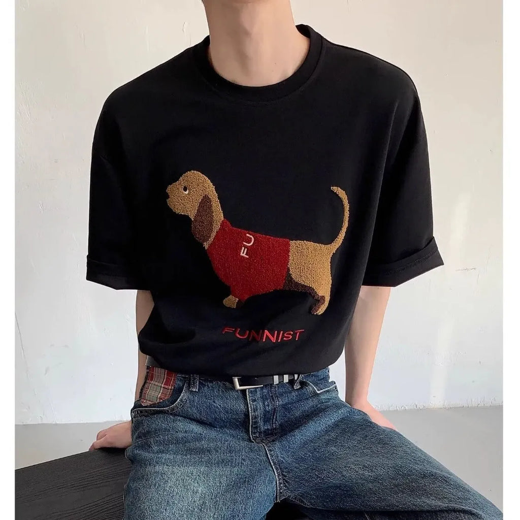 Grey men's cotton T-shirt with an embroidered cartoon dachshund holding a towel.