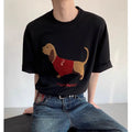 Grey men's cotton T-shirt with an embroidered cartoon dachshund holding a towel.