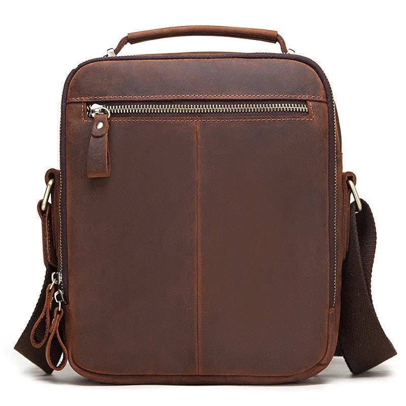 Men's brown leather crossbody bag with single-shoulder design showing sewing line details and business travel style