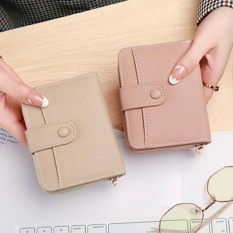 Ladies' short wallet with lychee pattern showing two-fold design in beige, pink, black, and red colour options