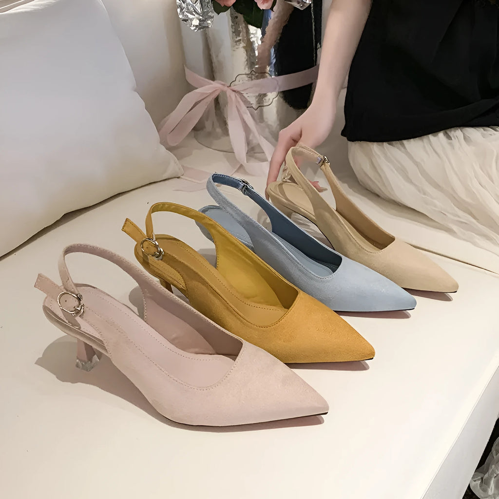 Women's pointed stiletto high heel shoes in suede, showing apricot, pink, blue, and yellow colour options.