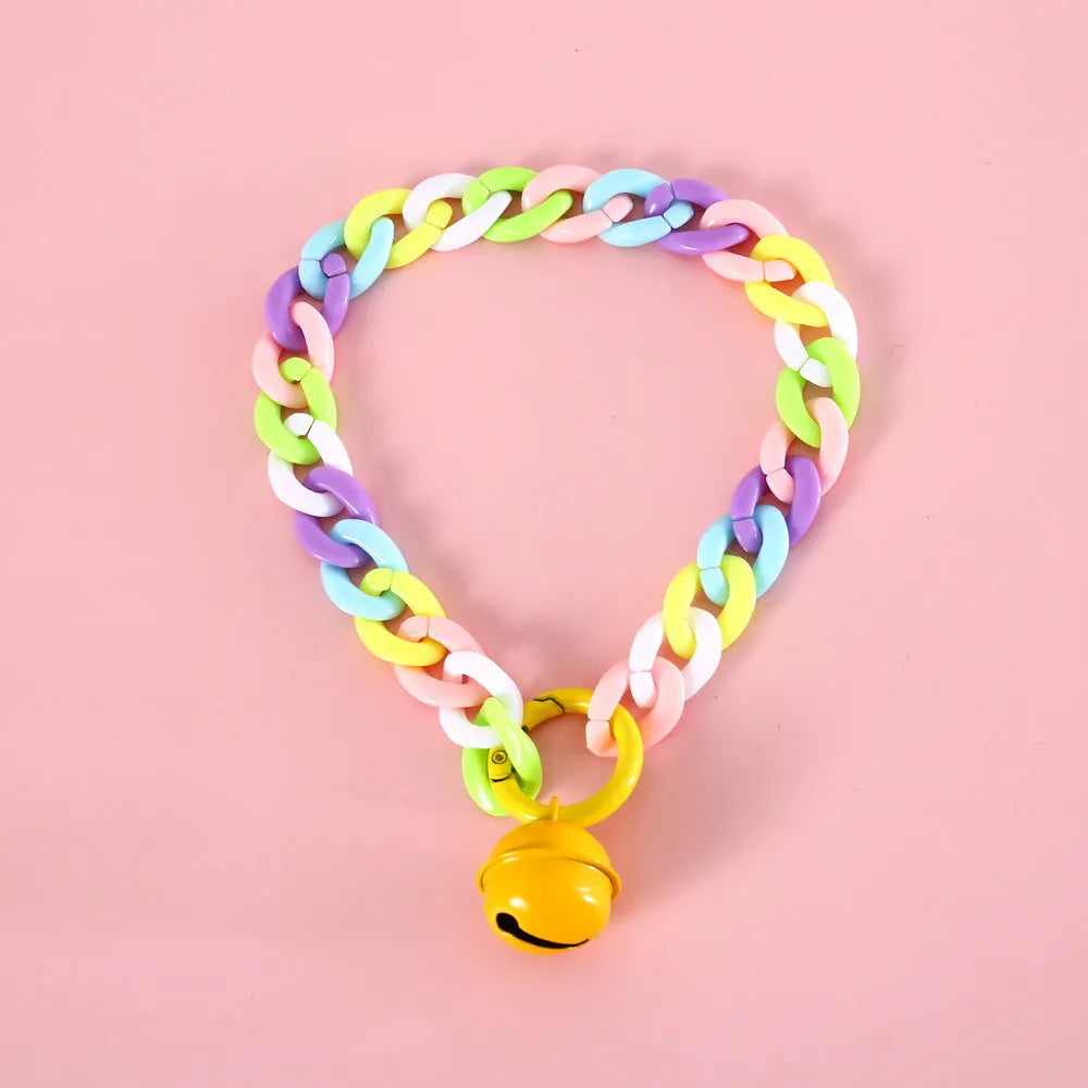 Macaron candy coloured plastic pet collar for cats, dogs, and rabbits in chain blue, pink, and mixed colours on a white background.