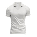 Man wearing a loose-fit apricot coloured V-neck short sleeve cotton blend T-shirt.