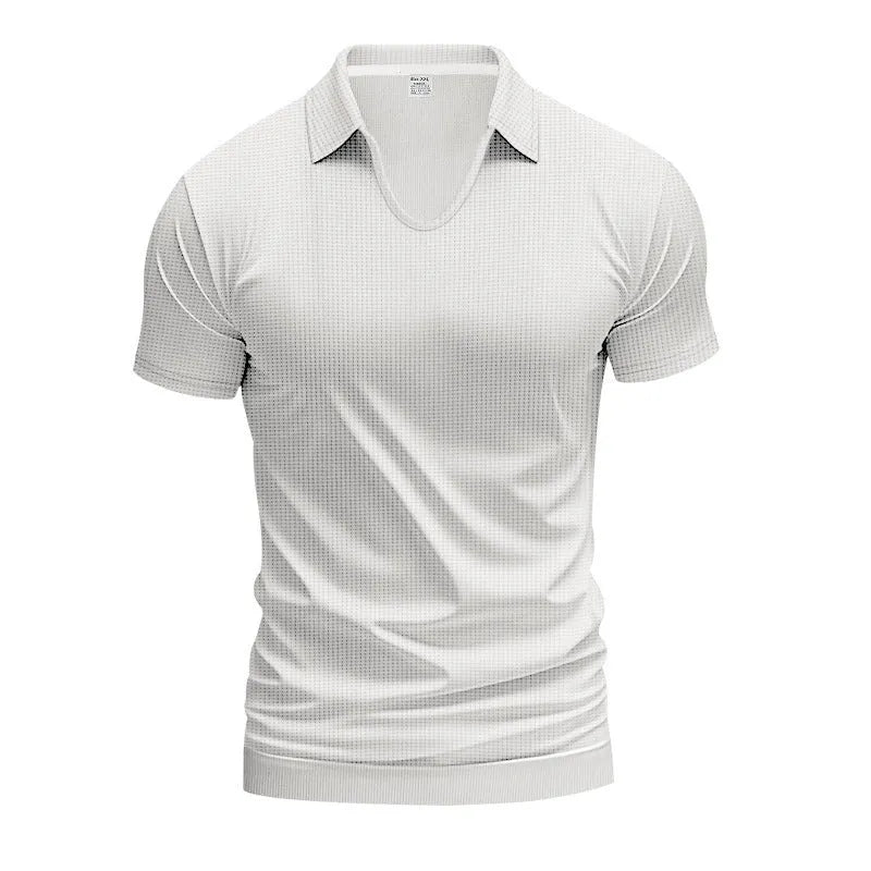 Man wearing a loose-fit apricot coloured V-neck short sleeve cotton blend T-shirt.