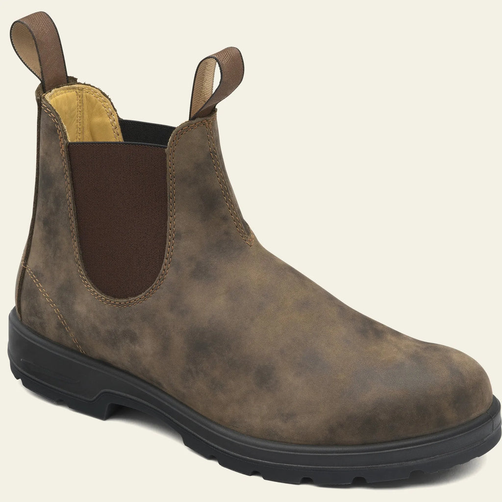 Vintage frosted brown Chelsea boot with round toe and mid-calf height on a neutral background.