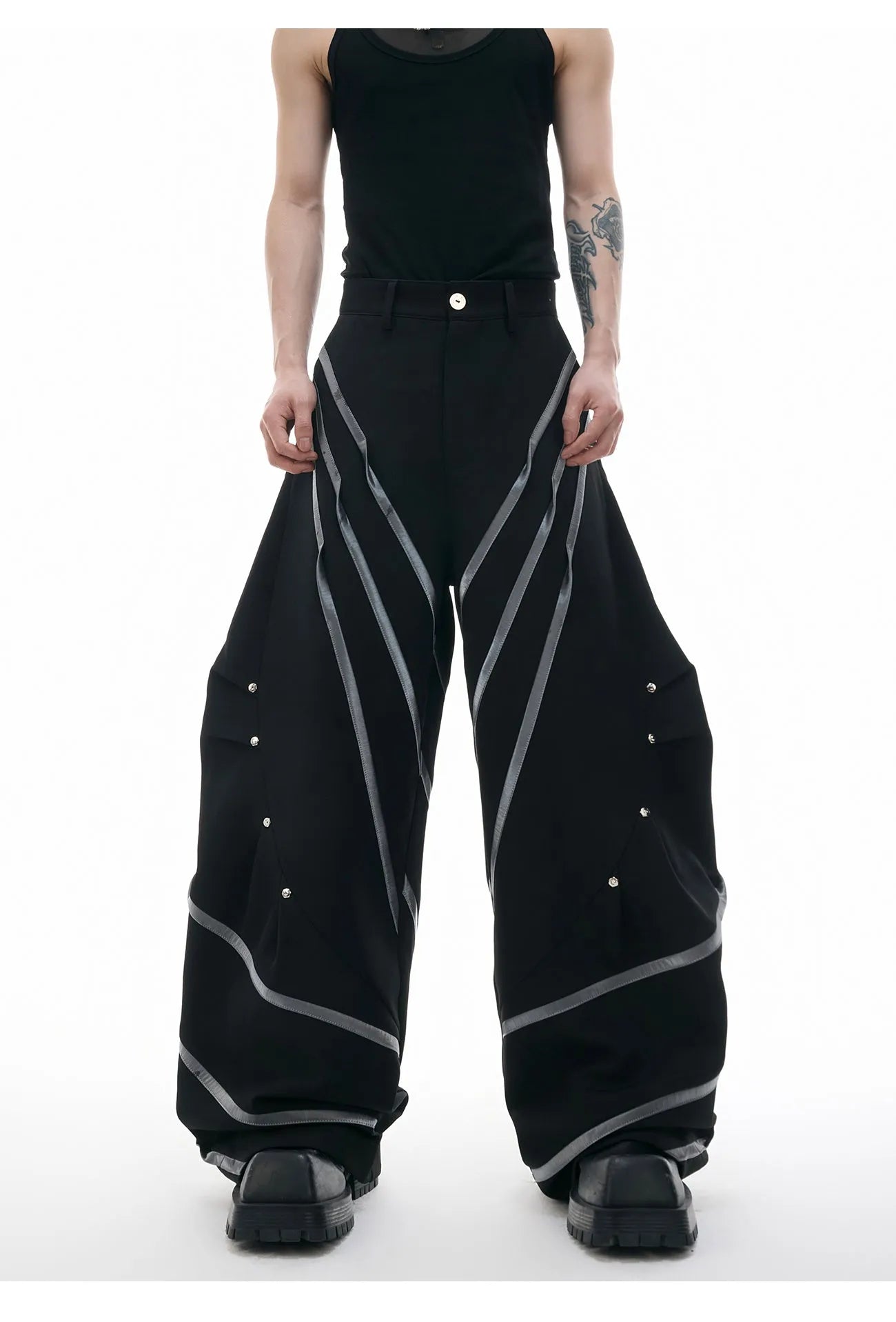 Men's black trousers with metal striped rivet pleats and three-dimensional cutting detail