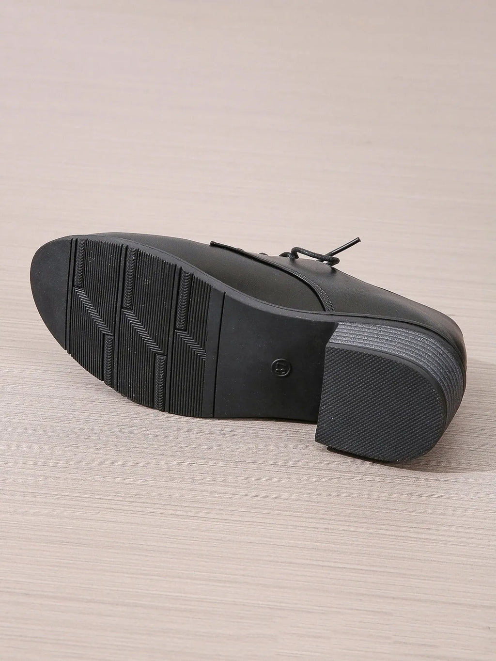 Black women's work shoes with thick chunky heel and low-top design
