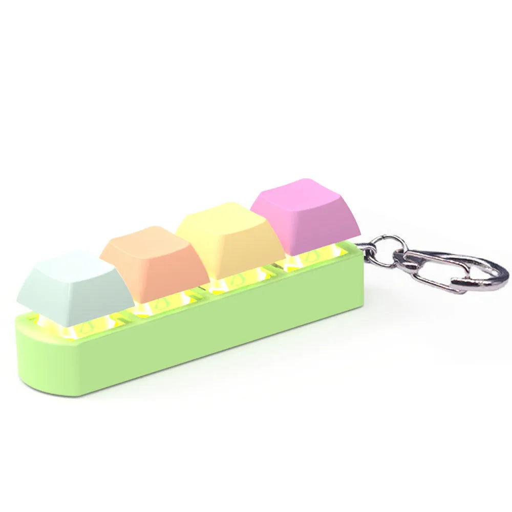 4-key mechanical keyboard switch tester with transparent bottom shell on desk