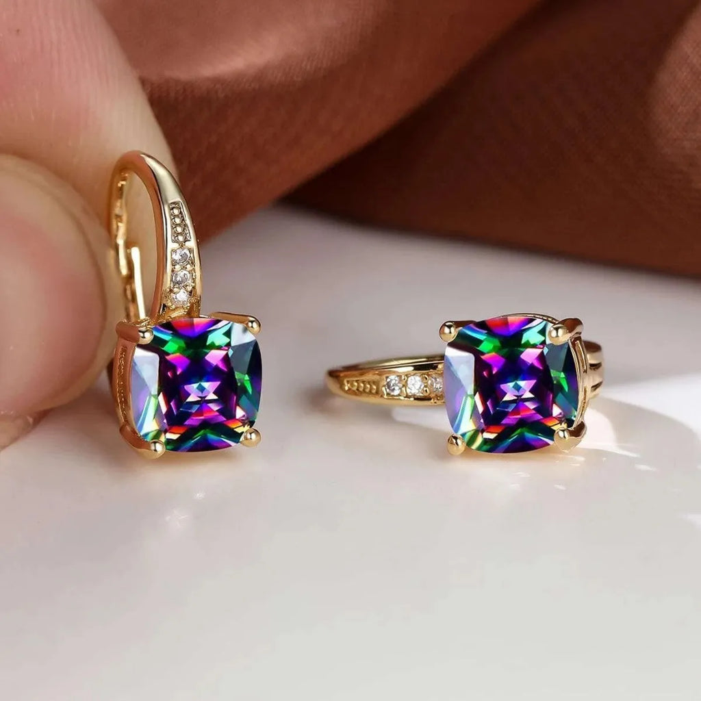 Square geometric ear clips with colourful moissanite stones in gold and silver electroplated finishes.