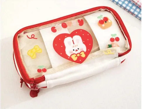Transparent TPU pencil case with decorative rabbit designs in pink and red colour options