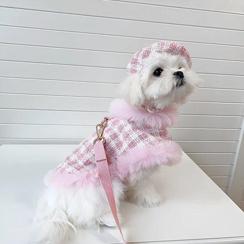 Pink polyester cat cloak with attached rope and matching beret for winter wear.