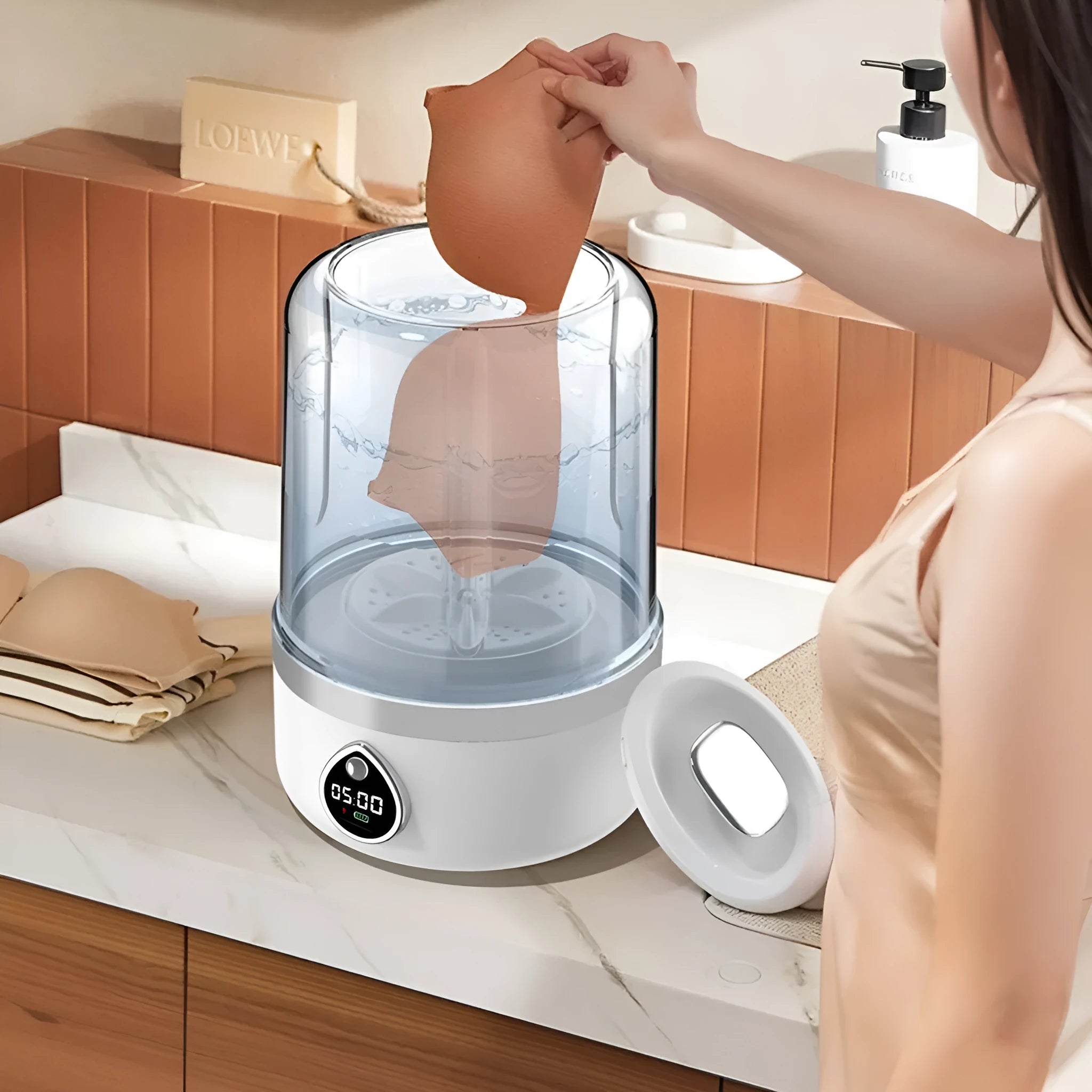 White portable USB-powered mini washing machine with waterproof storage compartment