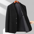 Man wearing a loose-fit solid colour polyester coat for spring or autumn.