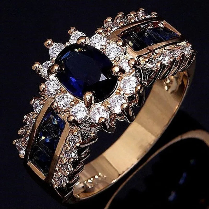 Personalised zinc alloy ring with diamond treatment in sunflower blue or square purple and blue zircon designs.