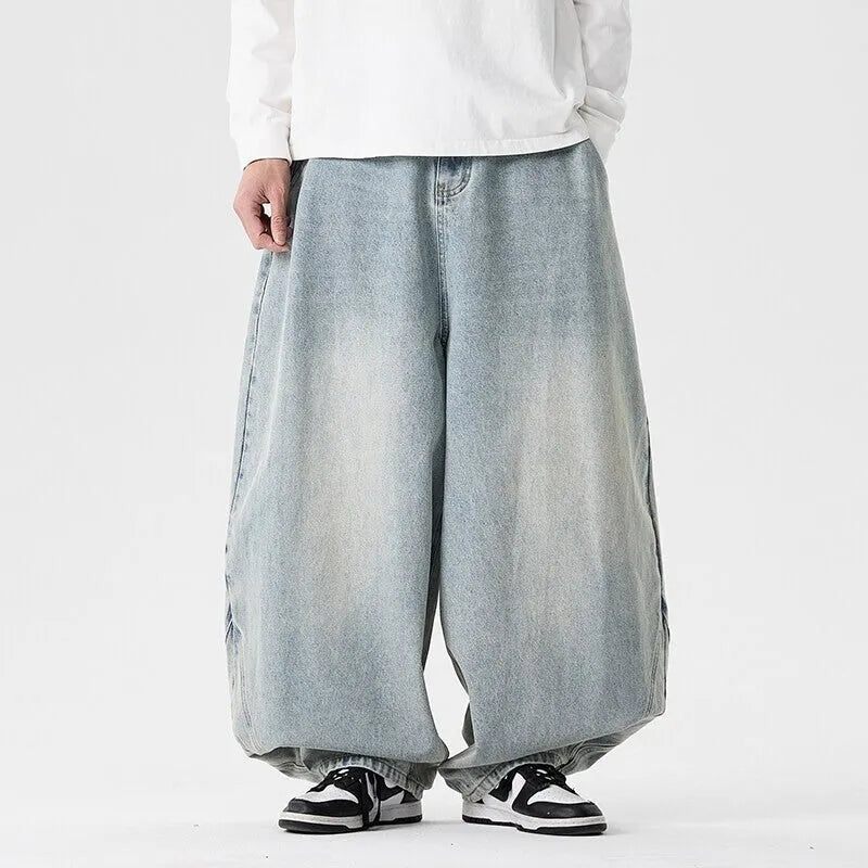 Men's plus size wide leg baggy jeans in black denim with straight leg openings