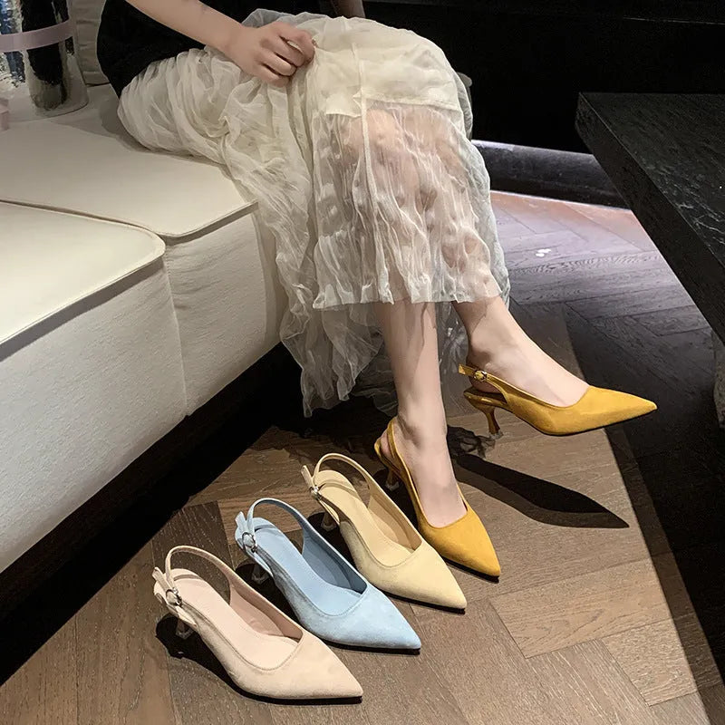 Women's pointed stiletto high heel shoes in suede, showing apricot, pink, blue, and yellow colour options.
