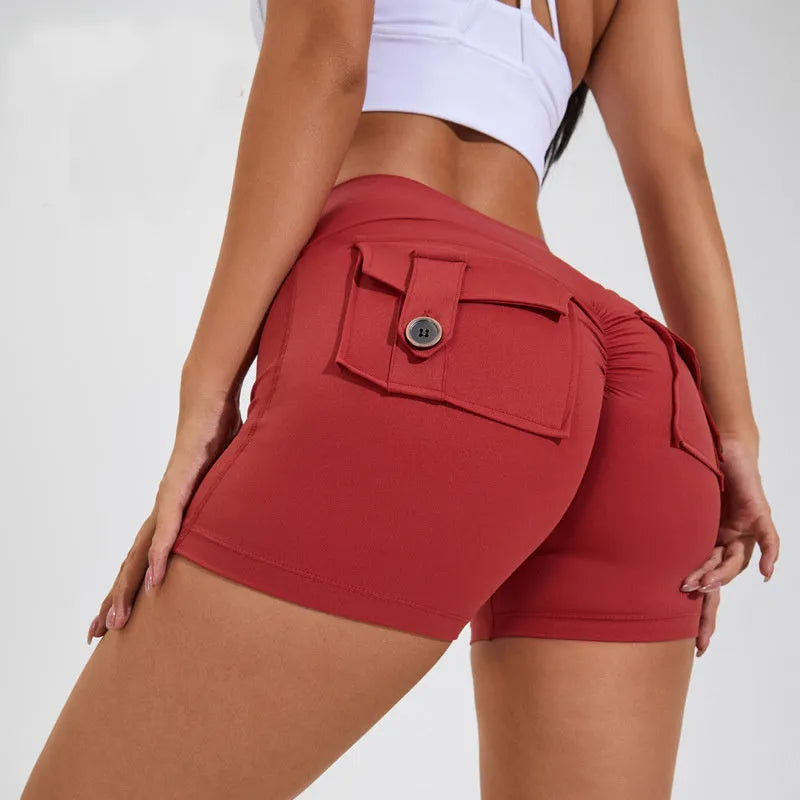 Women's high-waisted fitness shorts with pockets in various solid colours