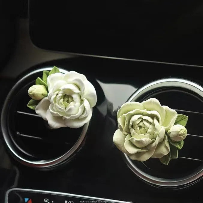 Solid jasmine car perfume for air outlet with gypsum base measuring 5 by 4.5cm