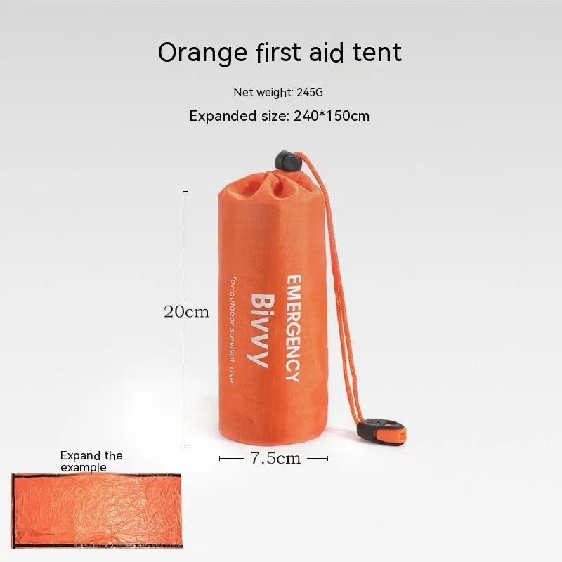 Orange portable disaster relief tent and sleeping bag kit set up outdoors.