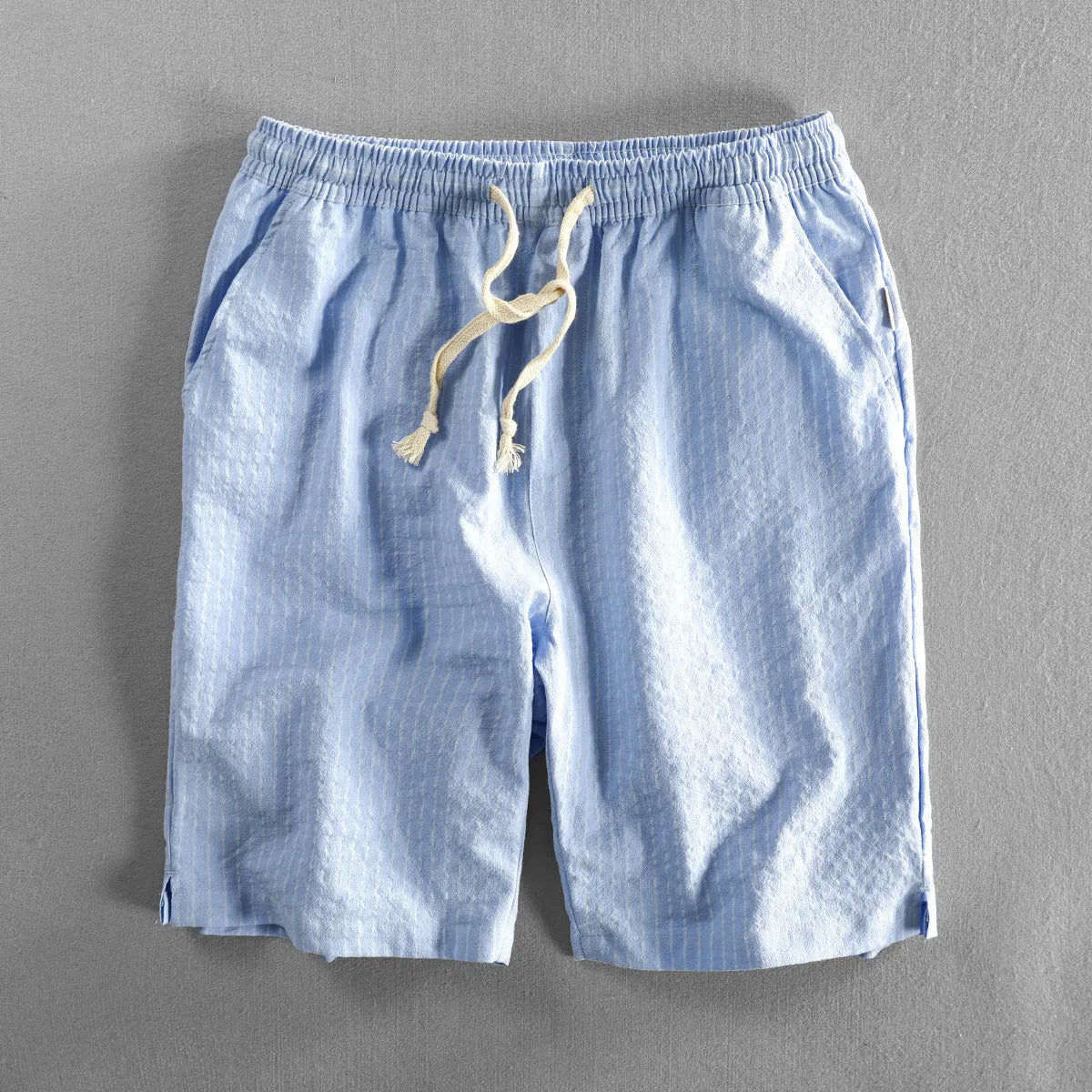 Men's striped casual shorts in cotton with elastic waistband shown in multiple colour options